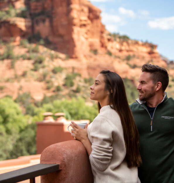 two guests enjoying coffee on a casita terrace