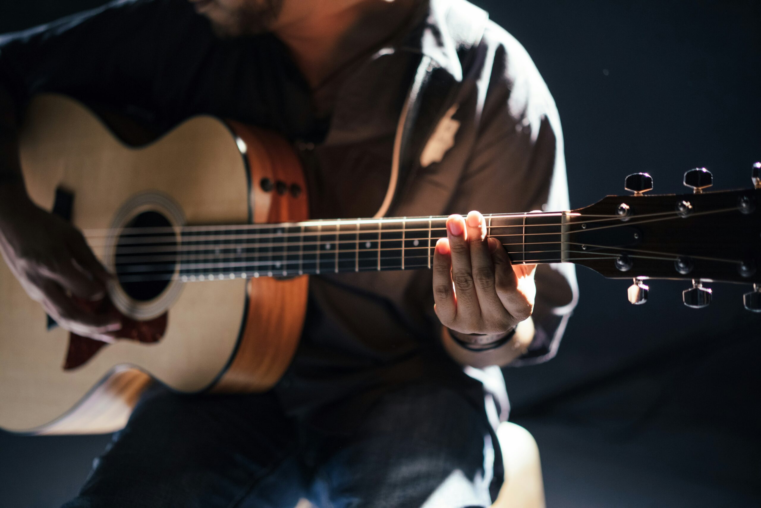 man playing guitar