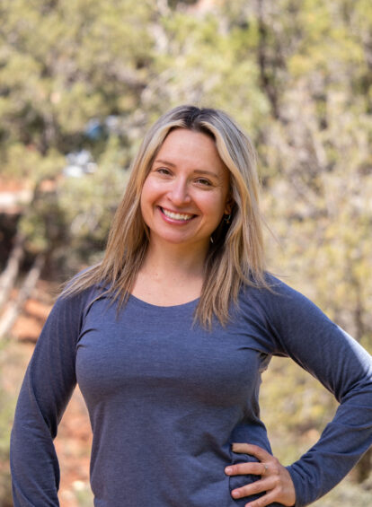 female hiking guide in blue shirt